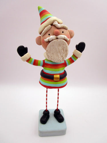 Christmas folk art colorful cheery Santa with out-stretched arms