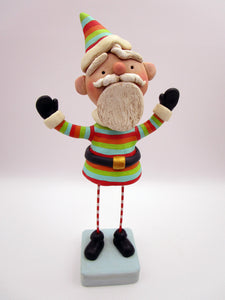 Christmas folk art colorful cheery Santa with out-stretched arms