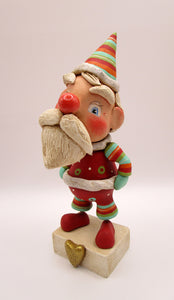 Christmas bohemian Santa with lots of stripes and crackle finish