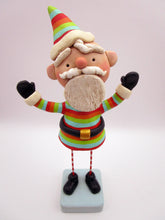 Christmas folk art colorful cheery Santa with out-stretched arms