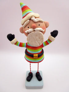 Christmas folk art colorful cheery Santa with out-stretched arms