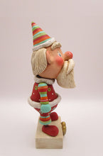 Christmas bohemian Santa with lots of stripes and crackle finish