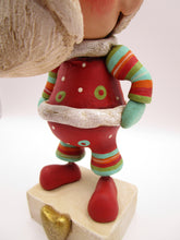 Christmas bohemian Santa with lots of stripes and crackle finish