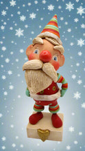 Christmas bohemian Santa with lots of stripes and crackle finish