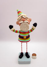 Christmas folk art colorful cheery Santa with out-stretched arms