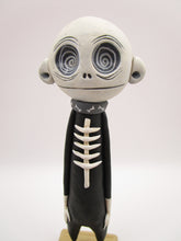 Halloween folk art spooky swirl eye character in skeleton suit