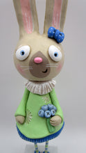 Tall Spring folk art or Easter rabbit wearing flower dress