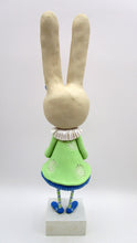 Tall Spring folk art or Easter rabbit wearing flower dress
