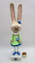 Tall Spring folk art or Easter rabbit wearing flower dress