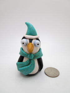 Christmas Penguin with sparkling teal scarf and hat