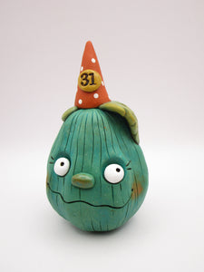 Halloween pumpkin character in teal with 31 hat