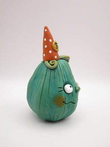 Halloween pumpkin character in teal with 31 hat