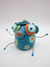 Monster folk art little teal monster with bendable arms and legs