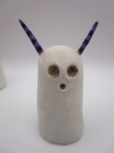 Halloween folk art spooky ghost with purple and black horns
