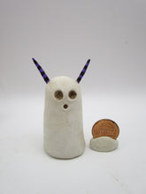 Halloween folk art spooky ghost with purple and black horns
