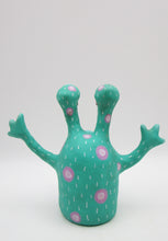 Monster folk art with realistic "teeth"
