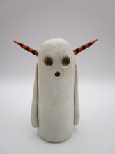 Halloween folk art spooky ghost with orange and black horns