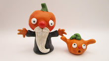 Halloween folk art old man pumpkin and little pumpkin boy