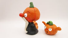 Halloween folk art old man pumpkin and little pumpkin boy