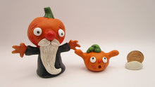 Halloween folk art old man pumpkin and little pumpkin boy