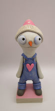 Valentine folk art snowman wearing "denim" like overalls