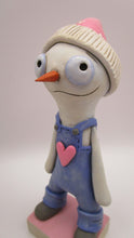 Valentine folk art snowman wearing "denim" like overalls