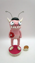 Valentine folk art monster dressed in lady bug costume