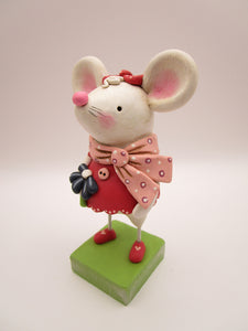 Valentine girl mouse in pinks holding dark blue flower