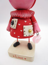 Valentines folk art pig wearing heart dress with pockets and cute charm