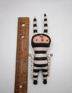 WALL piece black white striped character articulated arms wacky character