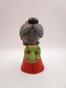 Halloween folk art Dog wearing a witch costume