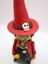 Halloween folk art witch with moon stick and pumpkin bucket