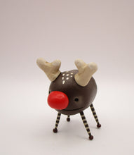 Christmas folk art small reindeer character with wood legs