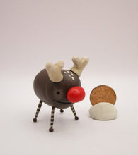 Christmas folk art small reindeer character with wood legs