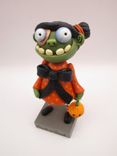 Halloween folk art GIRL zombie with hair buns and cotton spun charm