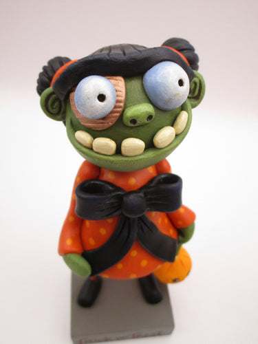 Halloween folk art GIRL zombie with hair buns and cotton spun charm