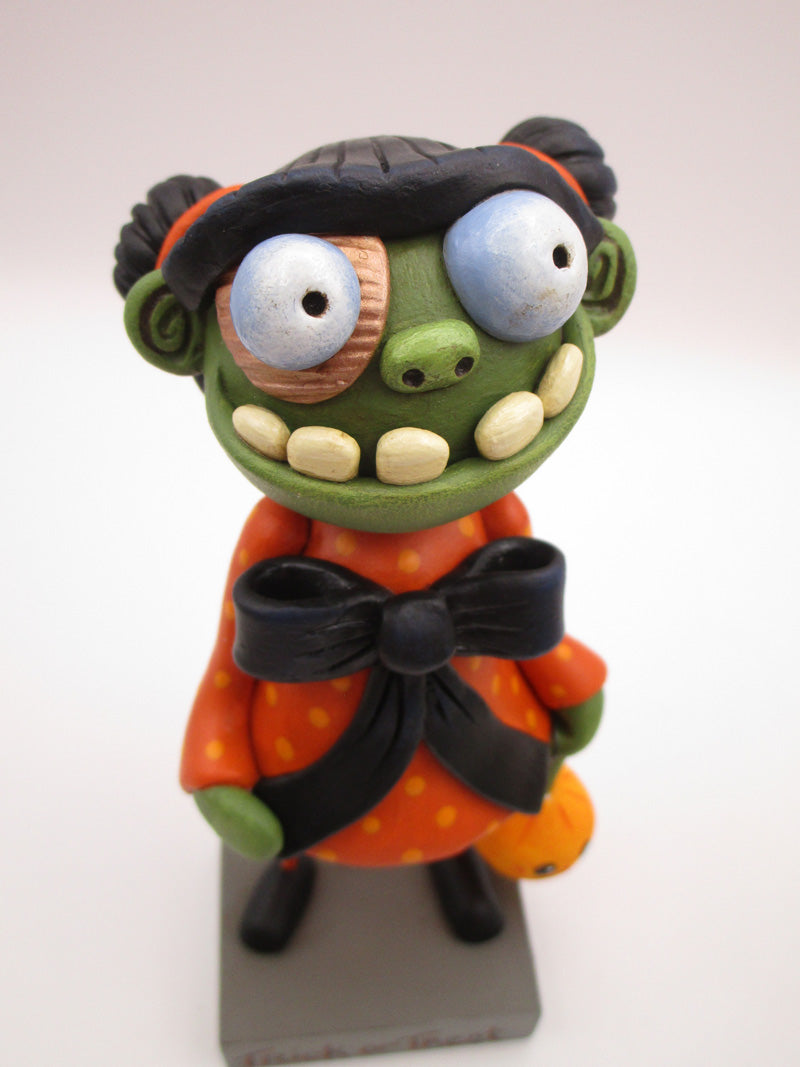 Halloween folk art GIRL zombie with hair buns and cotton spun charm