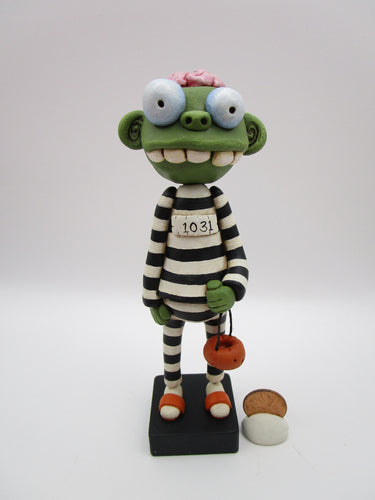 Halloween folk art Zombie in jail attire