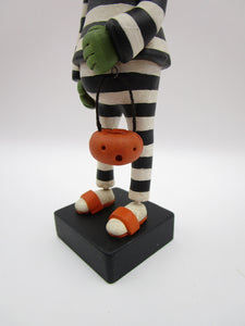 Halloween folk art Zombie in jail attire