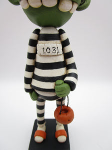 Halloween folk art Zombie in jail attire