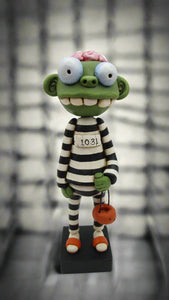 Halloween folk art Zombie in jail attire