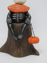 Halloween 31 Skelly Skeleton sitting on stump - trick or treater style