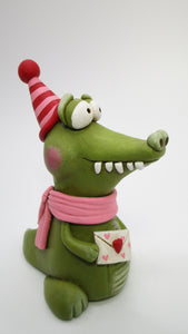 Valentines Alligator with Valentine in hand and cute party hat