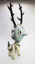 Large art character monster like with antlers and blue face 10 inches tall