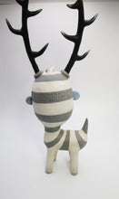 Large art character monster like with antlers and blue face 10 inches tall