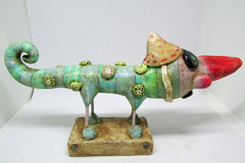 Wacky character with red nose chameleon like