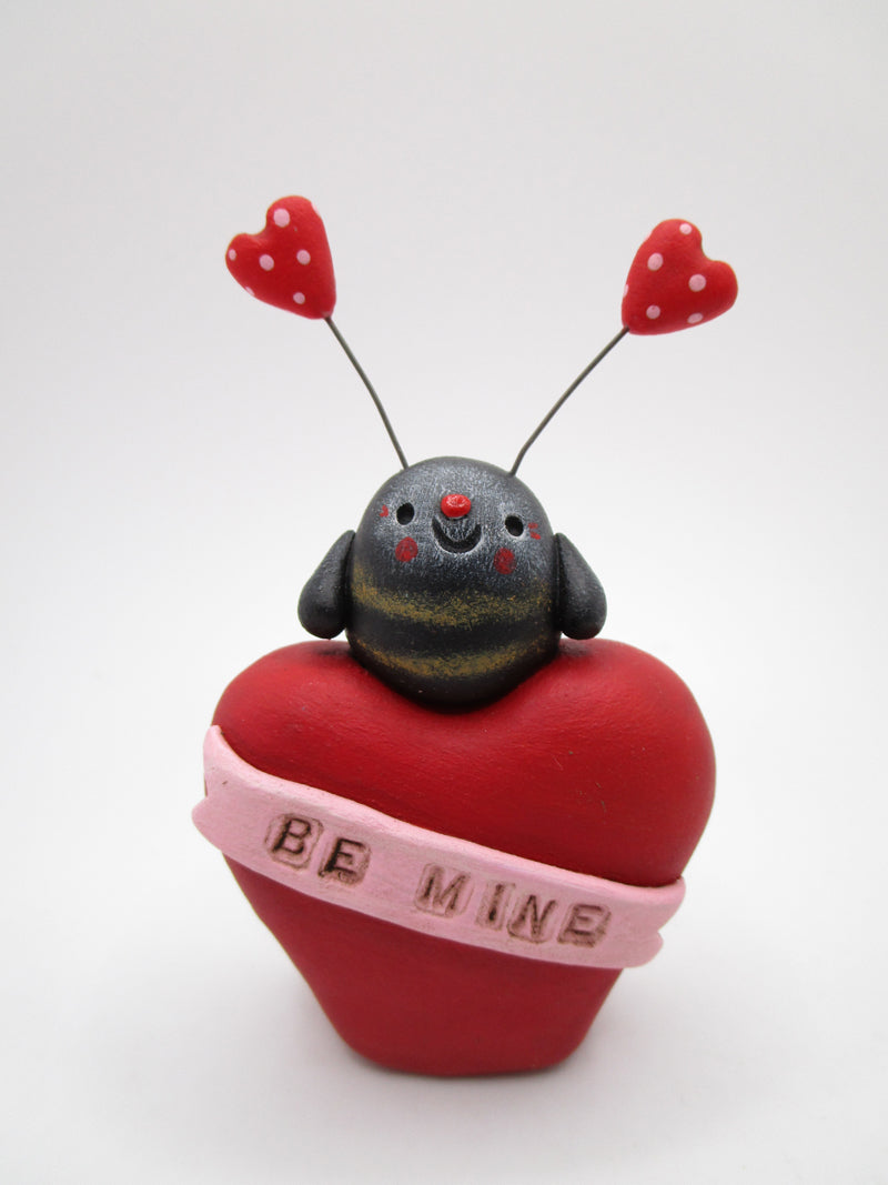 Valentines day Be Mine little chubby bee sitting on heart