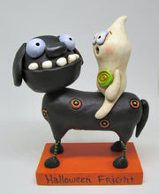 Halloween folk art black dog and ghost rider with candy