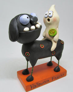 Halloween folk art black dog and ghost rider with candy