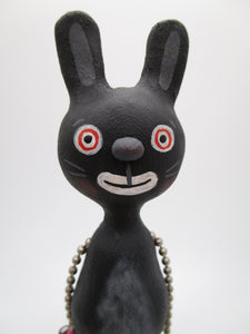 Easter bunny spring folk art black bunny with tiny basket